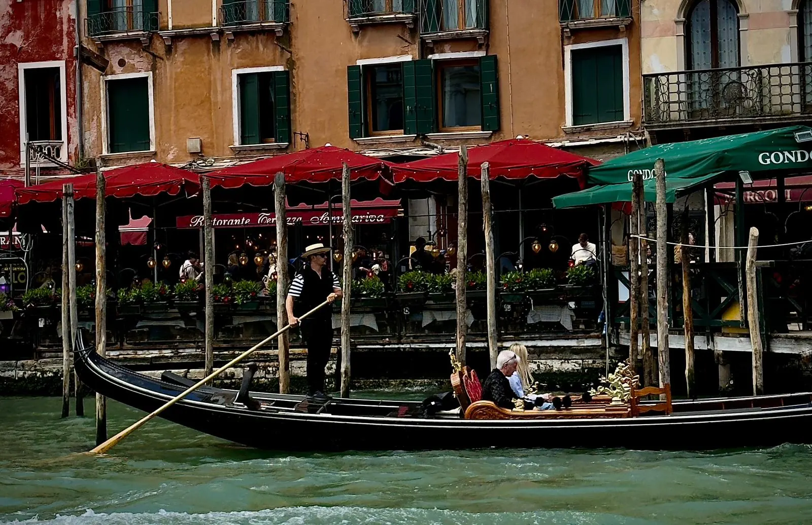 Gondola in front of Riva del Vin on the Grand Canal in Venice